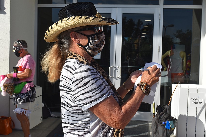 Joanne Forch votes for the best costume.