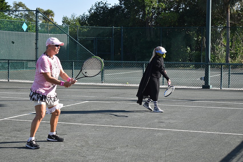 Joanne Christie and Dawn Holland warm up in costume.