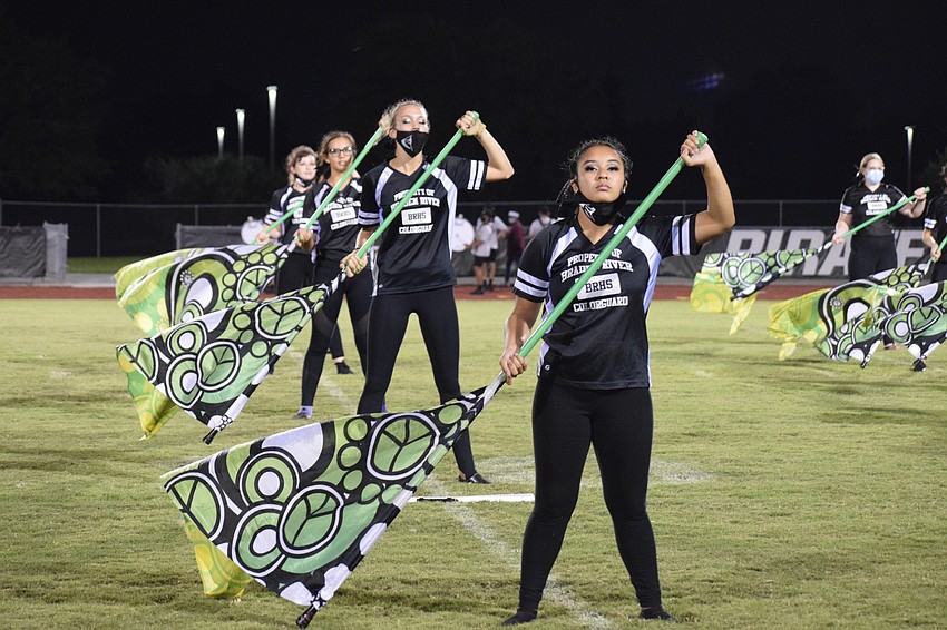 Color guard members ready their flags.