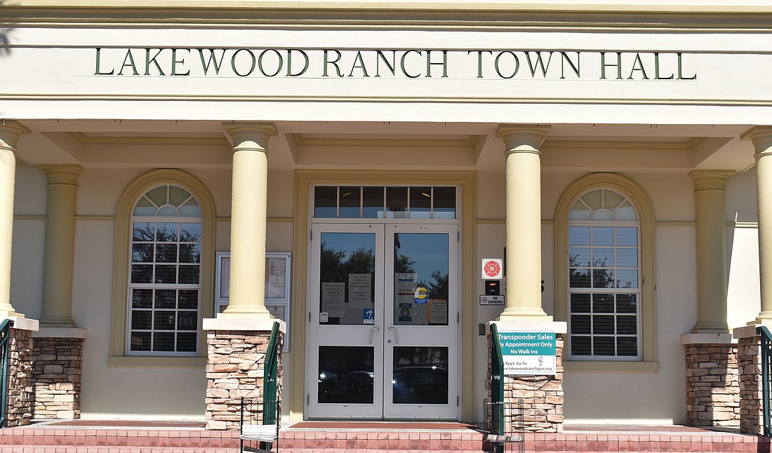 If you are planning to vote at Lakewood Ranch Town Hall, the line to cast ballots in person will lead through the back door on the porch.Â The ballot box for dropping off mailed ballots is also on the back porch.