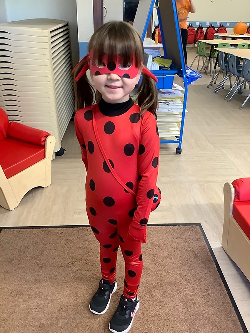 Sophia Spergl puts on the Miraculous Ladybug costume for the Parade of Costumes at Primrose School at Lakewood Ranch North. Courtesy photo.