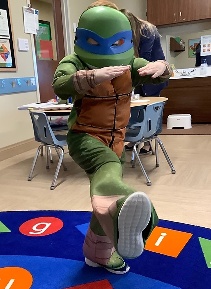 Gavin Deshaeis shows off his ninja moves while dressed as Leonardo from the Teenage Mutant Ninja Turtles for the Parade of Costumes at Primrose School at Lakewood Ranch North. Courtesy photo.