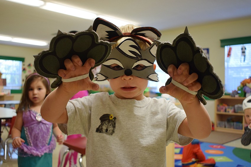 Misha Reus turns into a wolf as he growls.