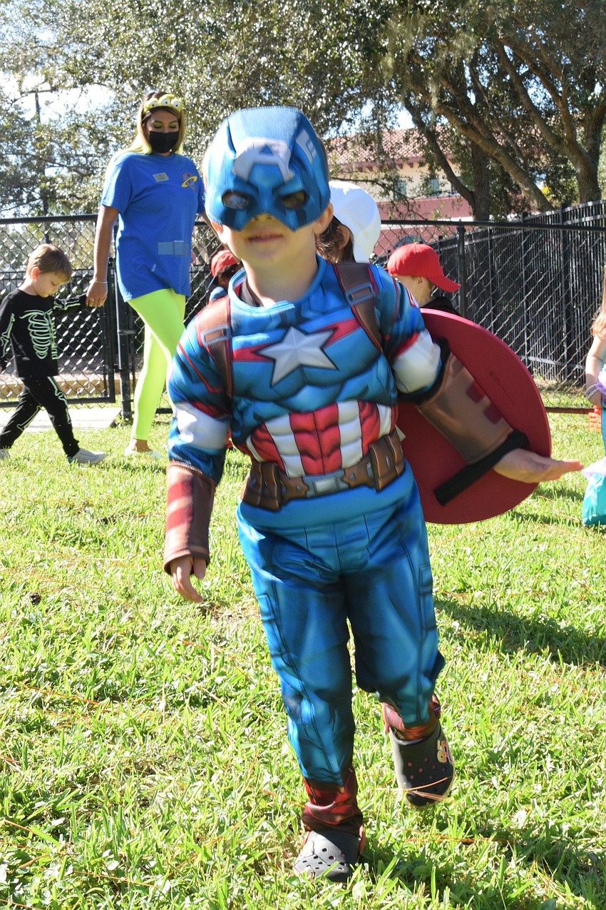 Mason Goldberg has fun during the parade before busting out his dance moves to the 