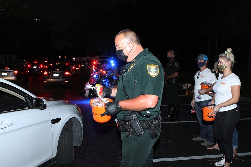 Deputy Luke Heyman handed out candy.