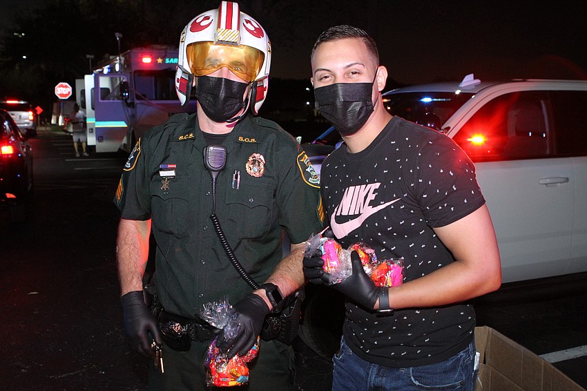 James Darby and Jeffrey Mendez were ready to hand out candy.