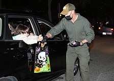 Chris Gilliland  passed out candy in his uniform.