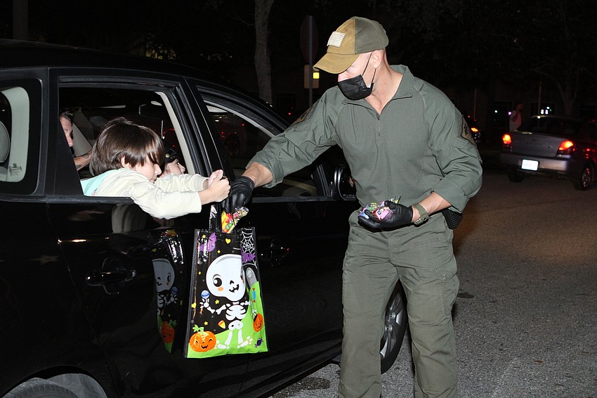 Chris Gilliland  passed out candy in his uniform.