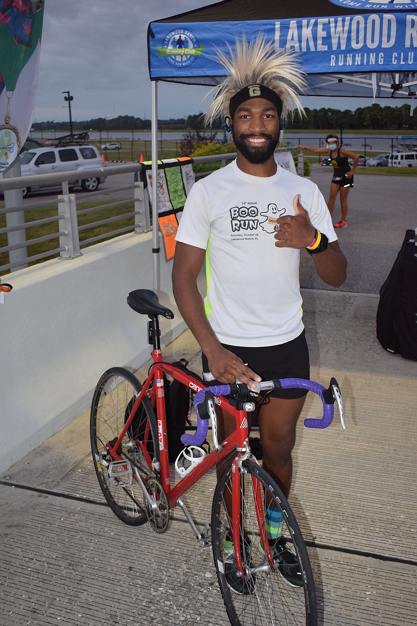 Palmetto's Alvin Ducre is a regular fixture at area benefit runs and he didn't mind riding his bike 19 miles to arrive at Nathan Benderson Park for the Boo Run.