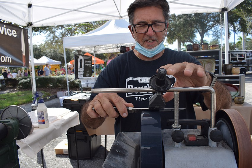 Bradenton's Van Balam is back at the Market with his Van's Sharpening Service. Twenty minutes after the Market opened, he had knives all over the counter to service.