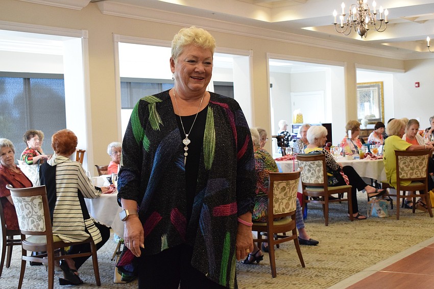 Jill Howell shows off her outfit as she walks down the runway.