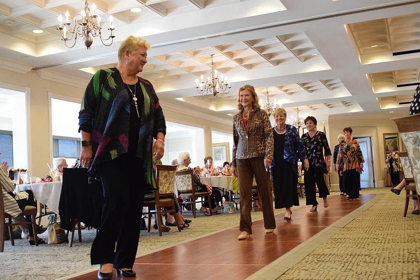 The models take their last turn down the runway.