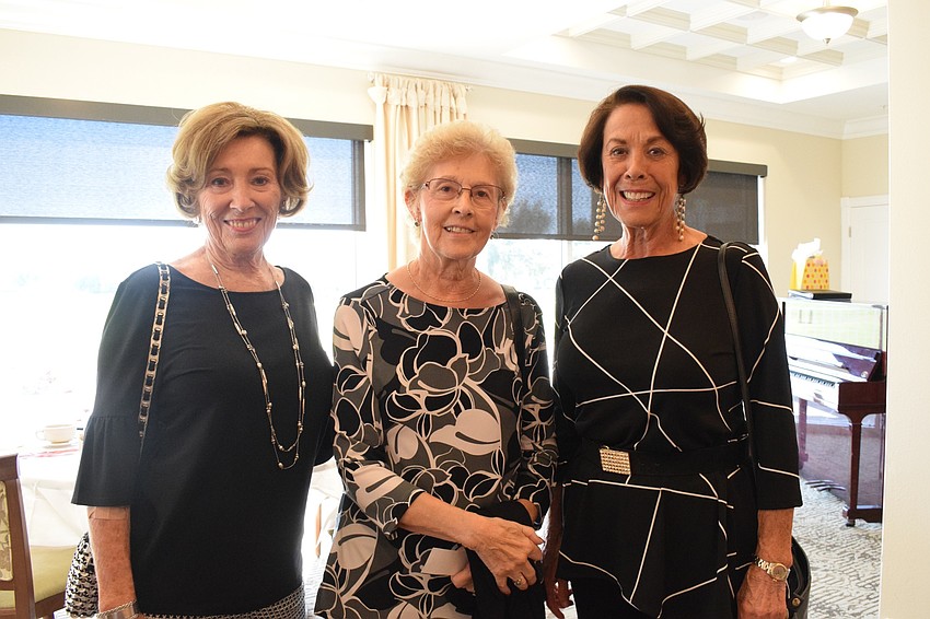 Pat Burgess, Joyce Rodo and Jane Haney enjoy the fall fashion show.