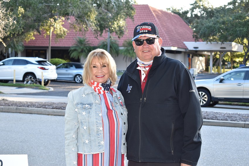 Jackie and Scott Gray of the Republican Club of Longboat Key pose for a photo on Tuesday outside of Town Hall.