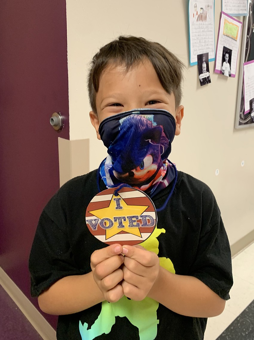 First grader Stone Vishinsky shows off his 