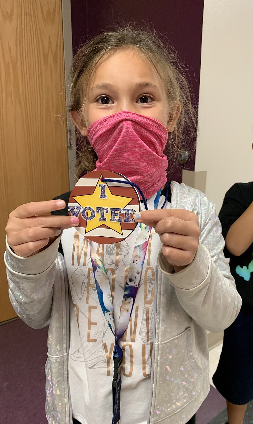 First grader Lexi Truxton is proud to show her 