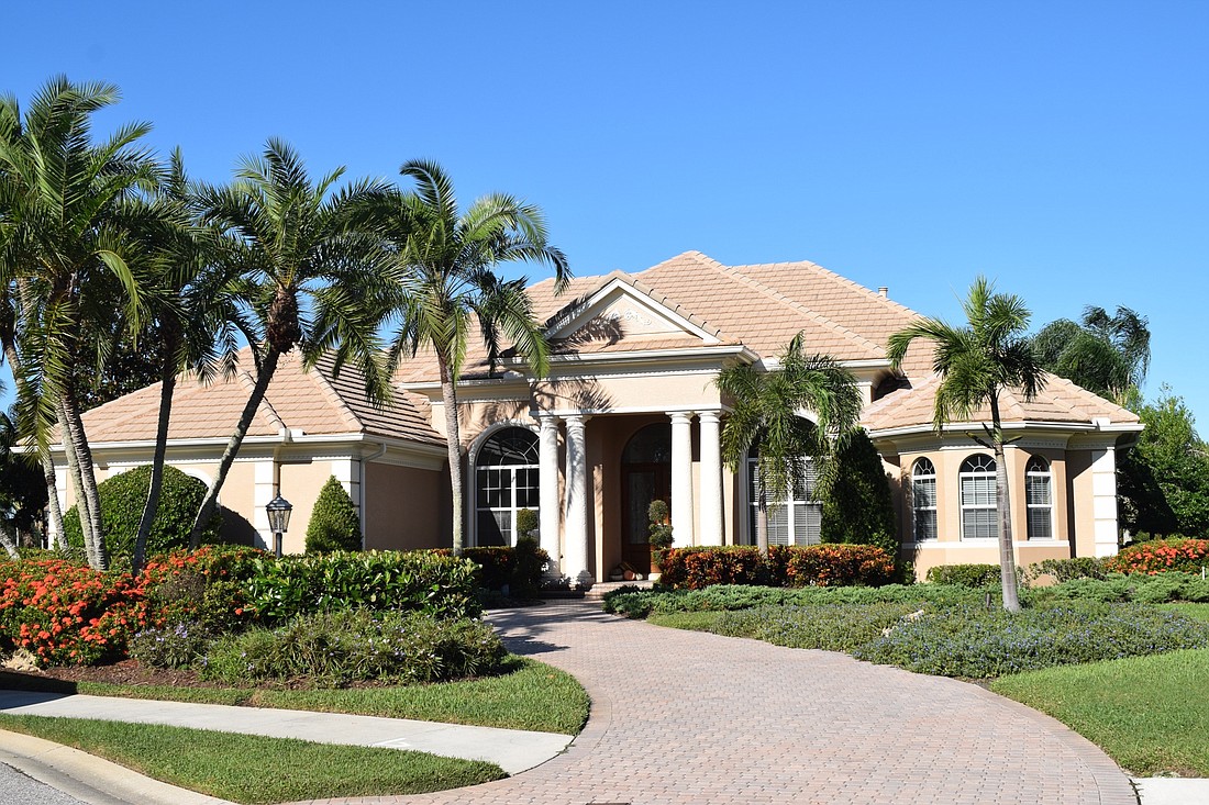 This Country Club at Lakewood Ranch home at 7003 Portmarnock Place sold for $1,085,000. It has three bedrooms, three baths, a pool and 3,539 square feet of living area.