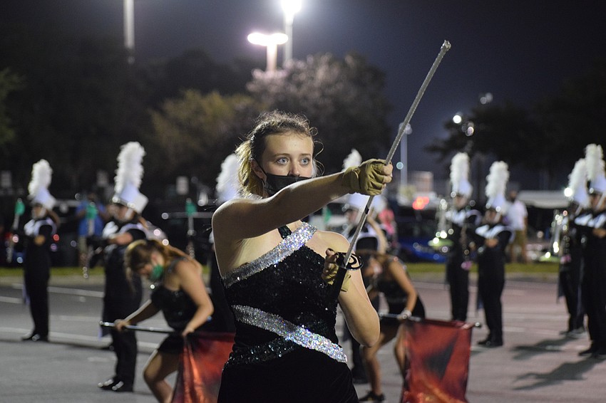 Paige Thompson uses a saber during the performance.