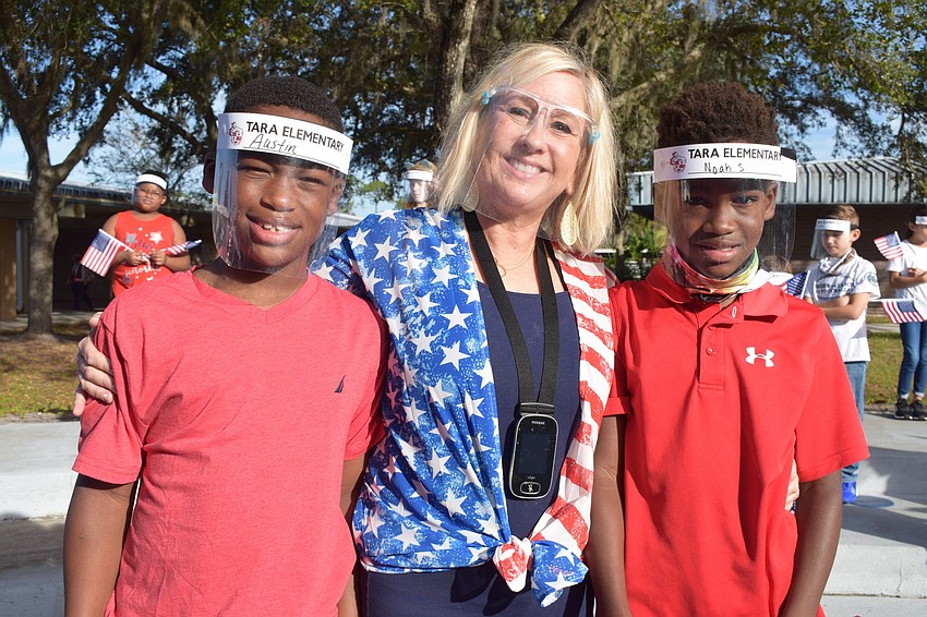 Austin, Barbara and Noah Siffermann are excited for the Veterans Day assembly.