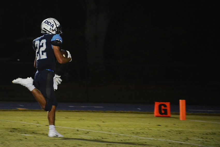 Nolan Lewellen jogs into the end zone untouched.