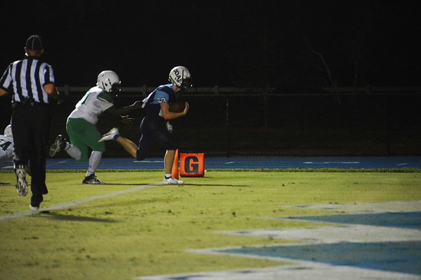 Grady Paxton fights for the goal line.