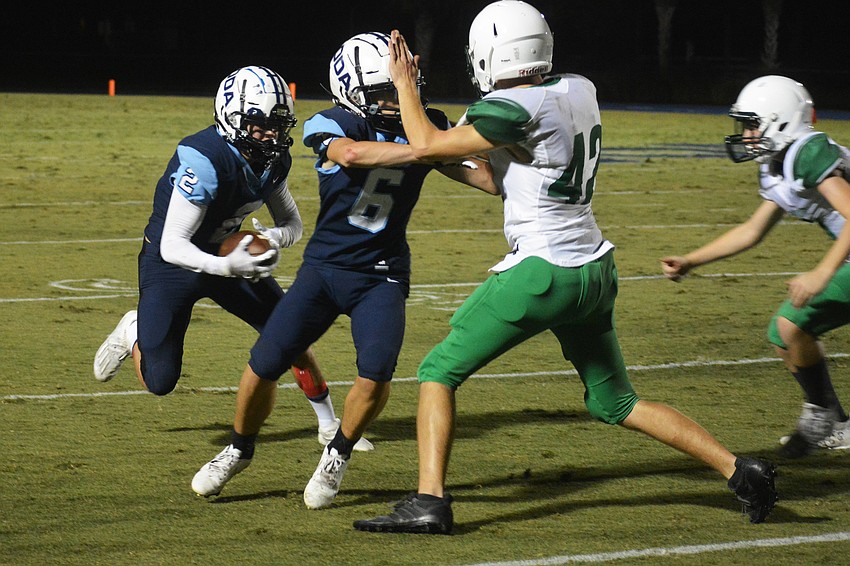 Ashton Lamb (2) turns upfield after catching a screen pass from Patch O'Keefe.