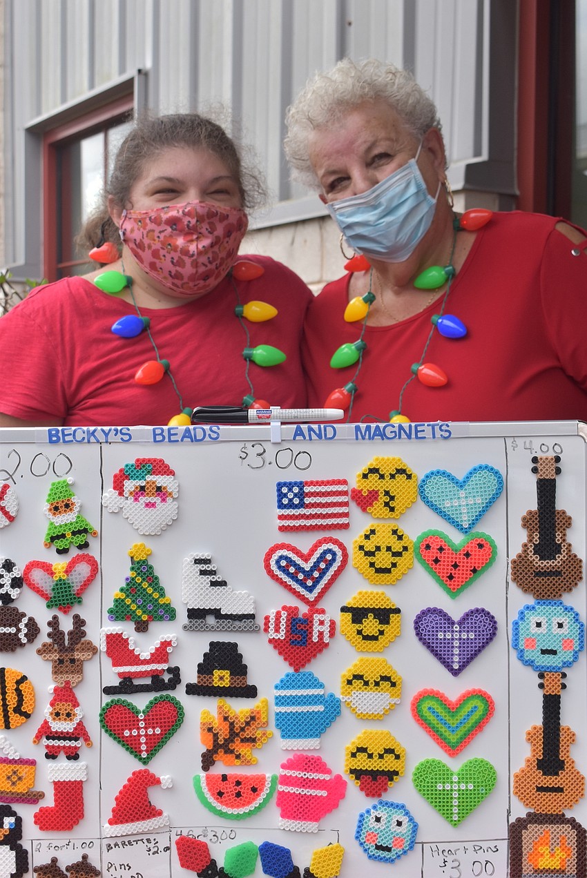 Becky Jaffer (left) and her mother, Cathy Jaffer run Becky's Beads and Magnets. Becky, who is a participant at Night with the Stars Prom, started making crafts while she was bored during the COVID-19 pandemic.
