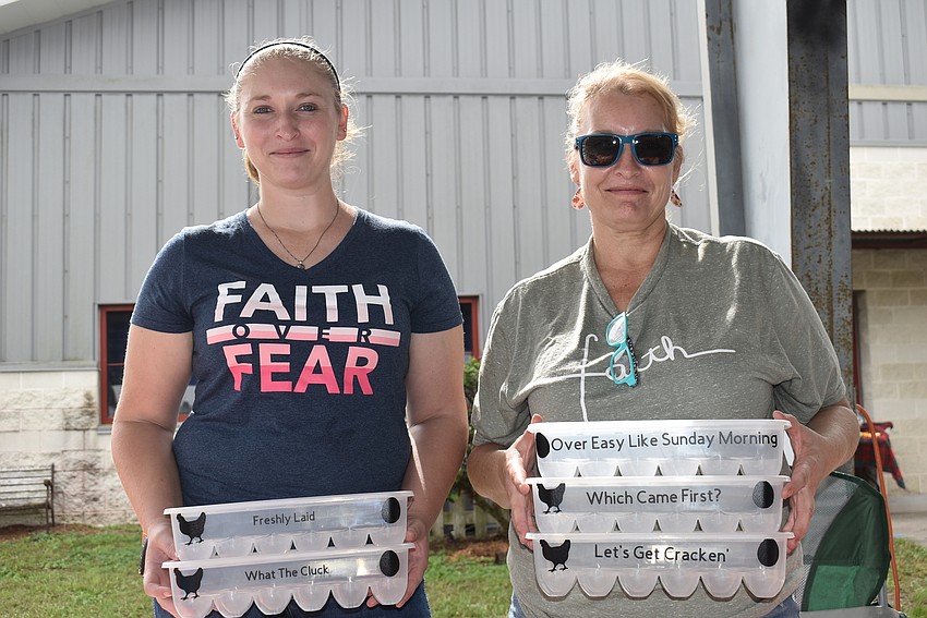 Audrey Tillett (left) and her mother, Barbara May, of Parrish at their first craft fair for Alana Strong Crafting, which is named for Tillett's late daughter, who died of a congenital heart defect.