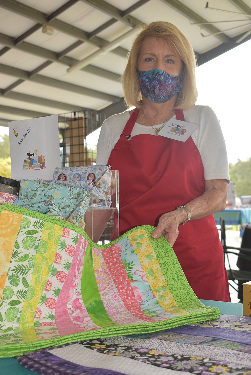 Louise Gray of Tidewater Preserve runs Sew Bee It!, which sells quilted blankets, mugs, masks and more.