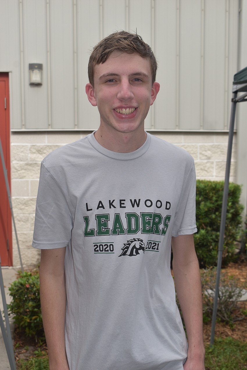 Joshua Holler volunteered at the craft show through Lakewood Leaders. He is a 10th grader at Lakewood Ranch High School.