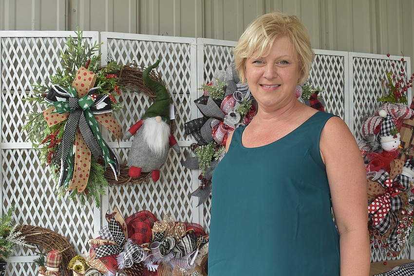 Amy Nowalk of Creekwood makes wreaths for Plank and Vine. She is friends with Night with the Stars Prom community relations director Angela Heck.