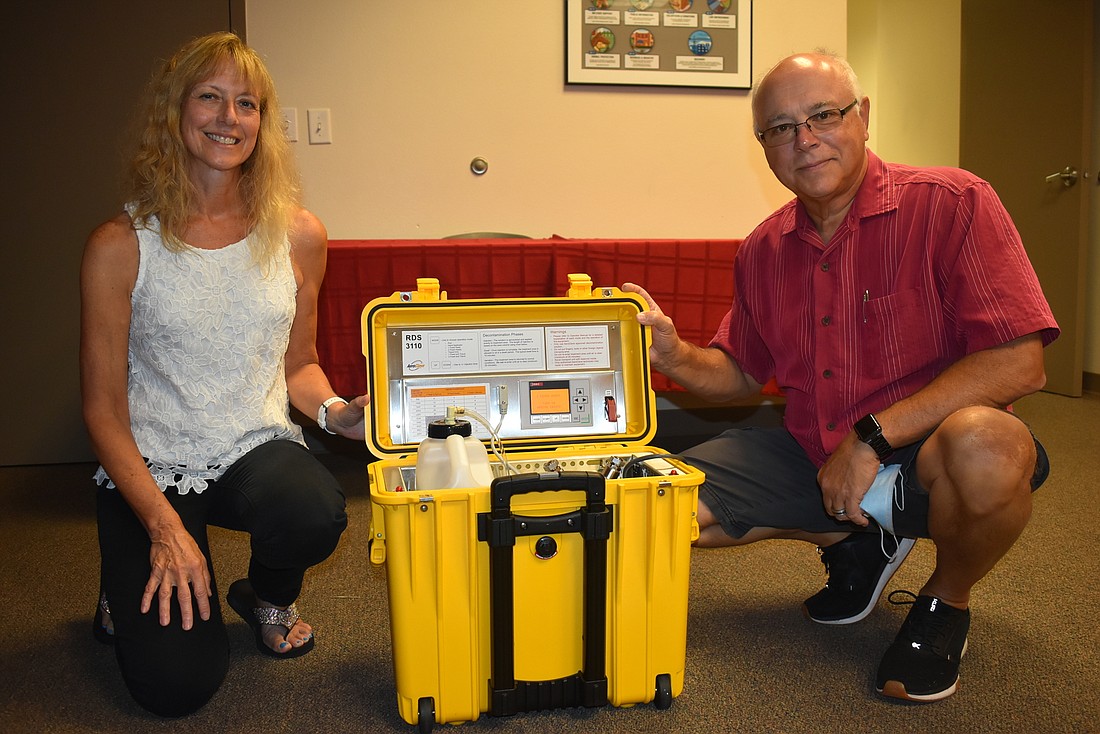 Giving Alliance of Myakka City Director Rose Riggle (left) and Myakka City Fire Department Chief Daniel Cacchiotti were instrumental in obtaining the Aeroclave RDS 3110 via a CARES Act grant.