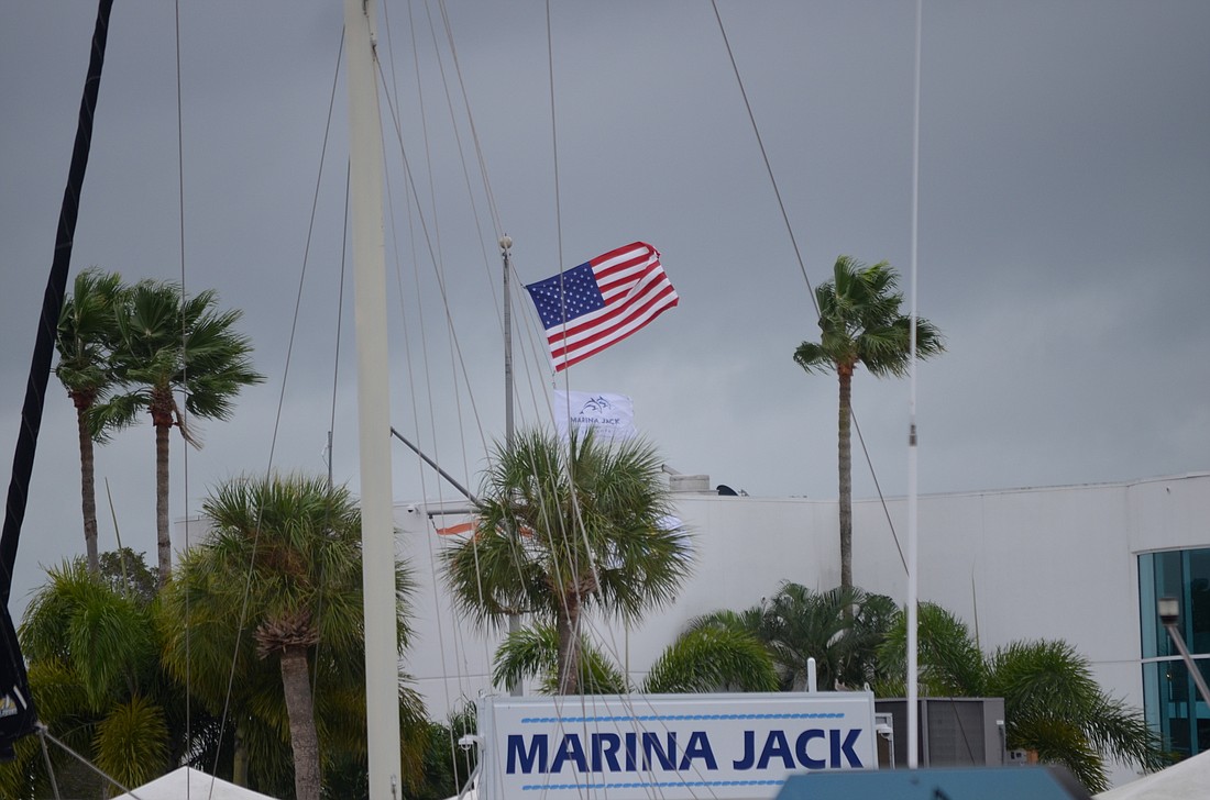 Flags were whipping in the wind Monday morning on Sarasota&#39;s bayfront.