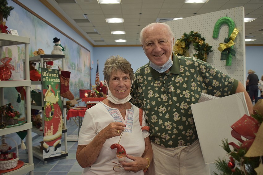 Midge and Tony Pescatello show off their newfound treasures.