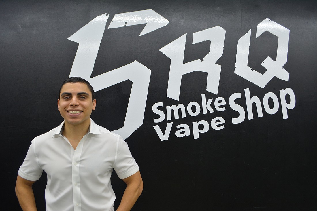 Matthew Johnson, owner of SRQ Smoke and Vape Shop, is optimistic that enhanced outdoor signage will bring more people into his business despite the effects of COVID-19.