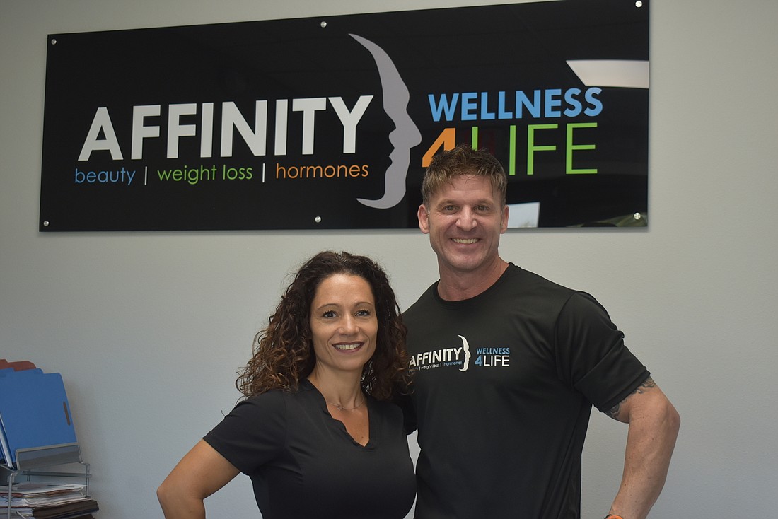Affinity Wellness 4 Life owner Dominic Louis Sorrentino (right) and office manager/marketing director Jamie Perea stand in the new 3,000 square-foot facility on Solutions Lane.