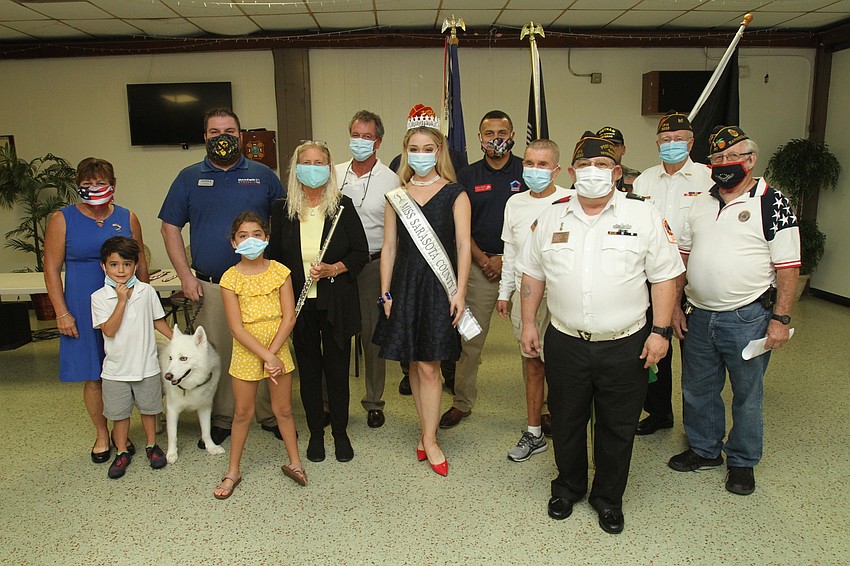 Ceremony participants posed for a photo.