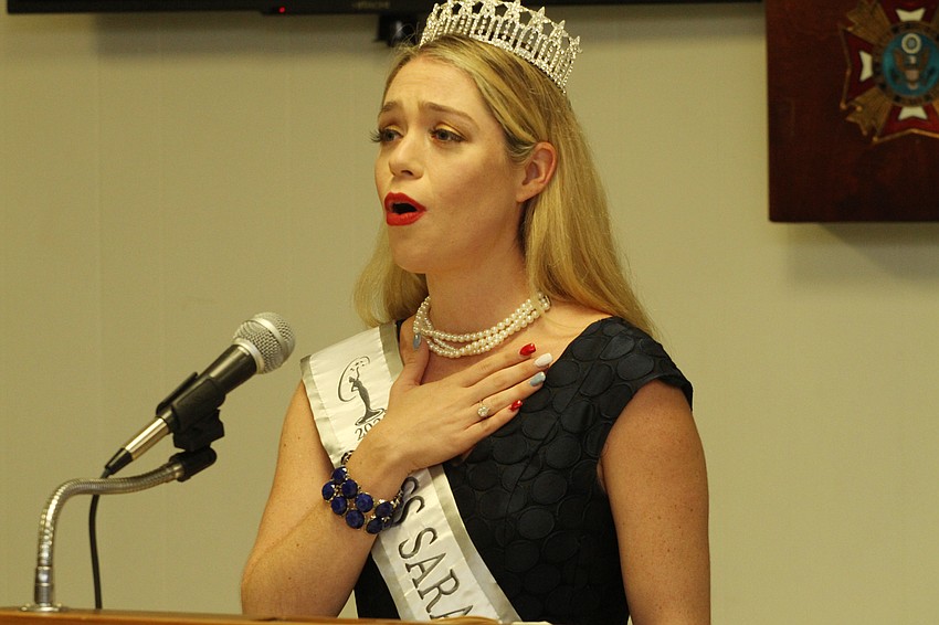 Lauren Nielsen sang the national anthem.