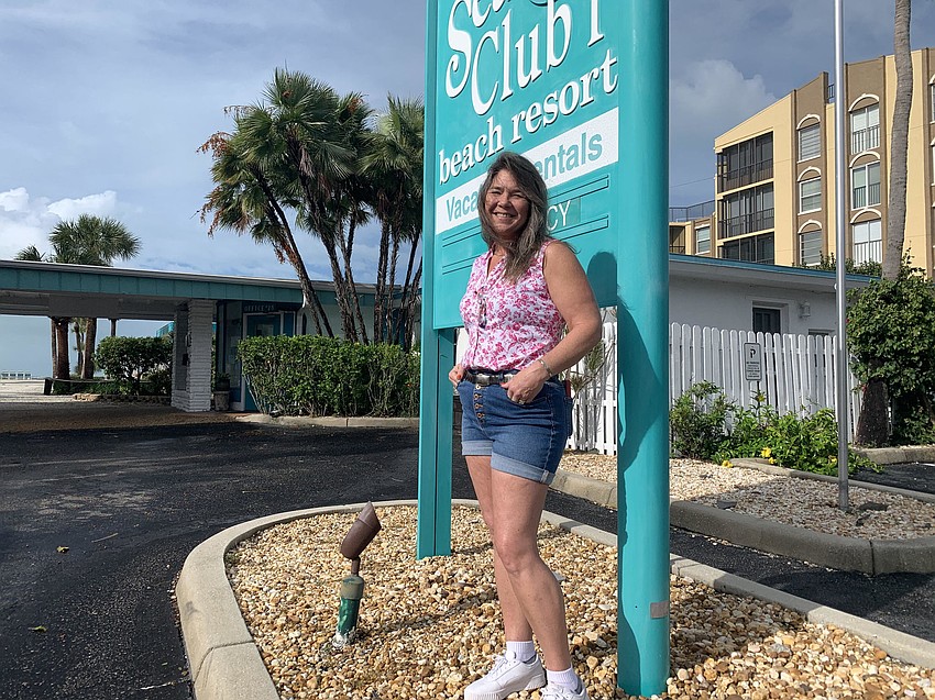 Lisa Bettis said the Sea Club Beach Resort is cleaning up some debris and tree damage, but overall fared well. (Mark Bergin)