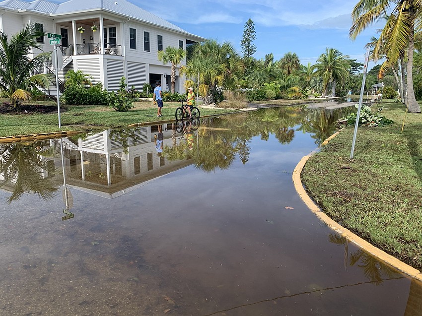 Flooding along Broadway Street in Longbeach Village has receded a bit. (Mark Bergin)