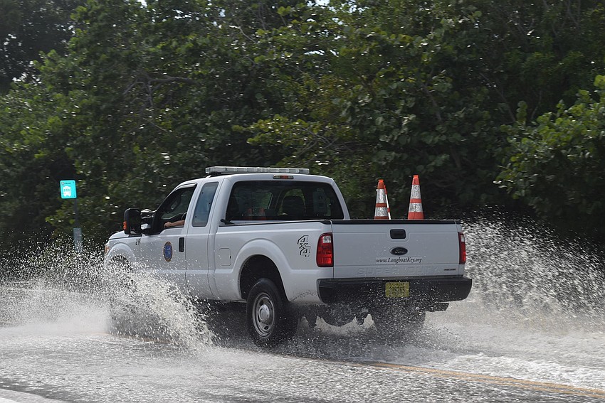 Water was standing in the 6000 block of Gulf of Mexico Drive  on Thursday morning.