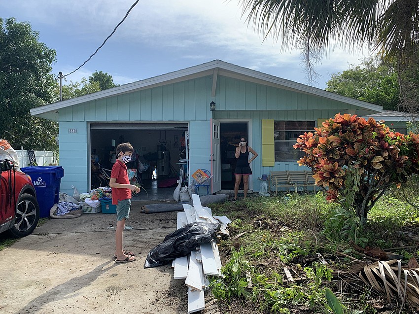 The Claypooles on Fox Drive were preparing to move out belongings to facilitate repairs.(Nat Kaemmerer)
