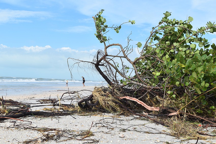 Beach erosion is shown at the public beach access point near 100 Broadway St.