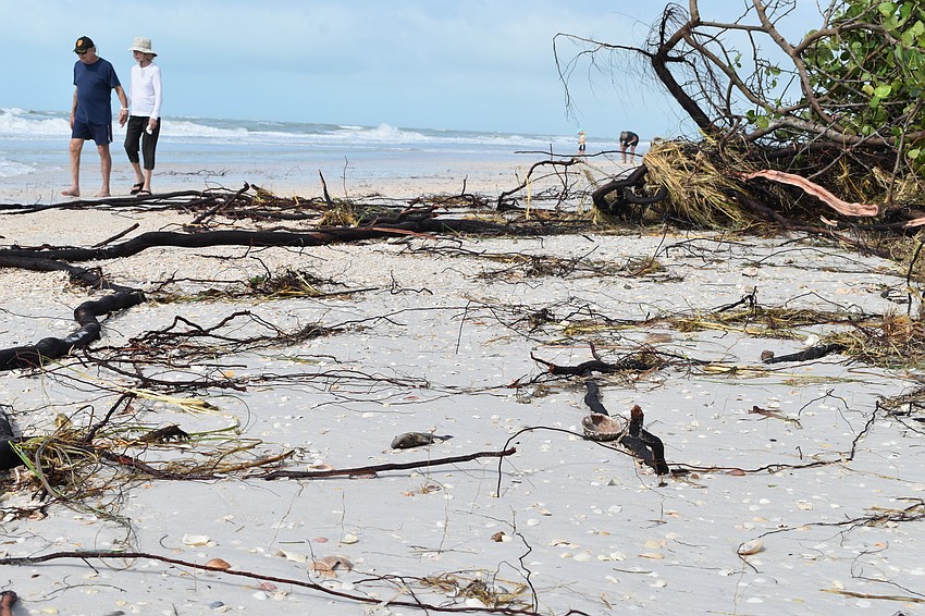 Beach erosion is shown at the public beach access point near 100 Broadway St.
