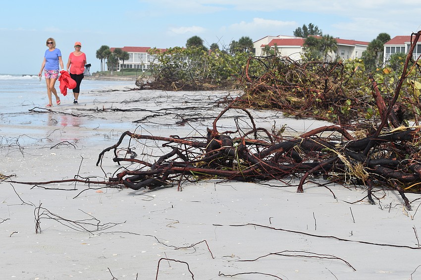 Beach erosion is shown at the public beach access point near 100 Broadway St.