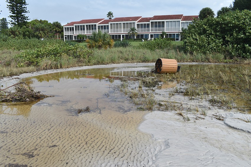 Beach erosion is shown at the public beach access point near 100 Broadway St.
