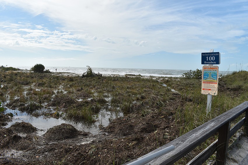 Beach erosion is shown at the public beach access point near 100 Broadway St.