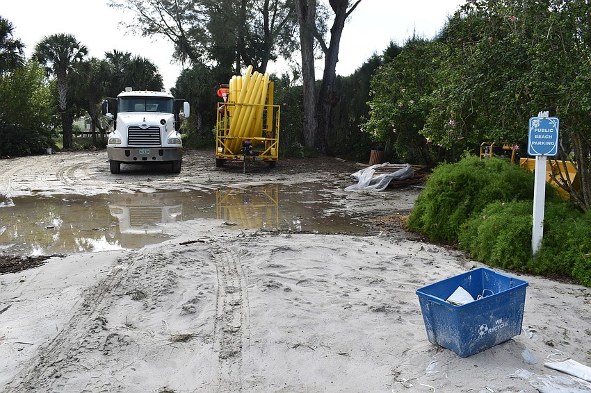 Sand and standing water at 100 Broadway St.