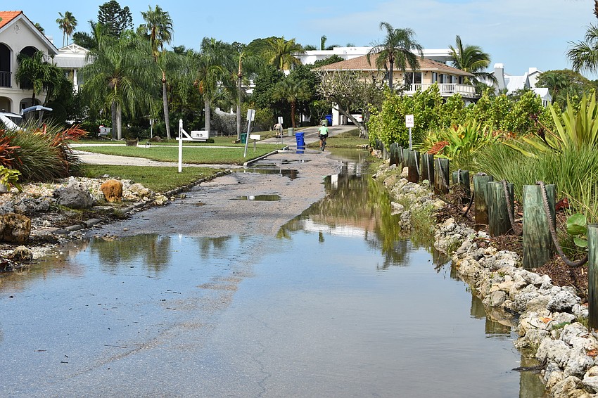 Stormwater runoff on Thursday morning is shown from Bayside Drive.