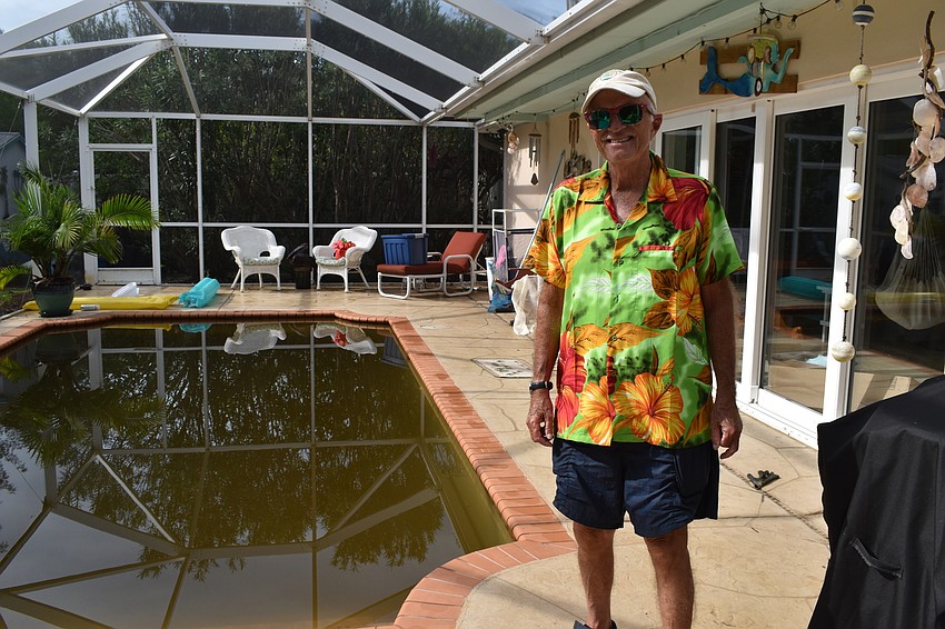 The stormwater from Eta caused Fred Kagi's pool to overflow. The water flooded Kagi's home.